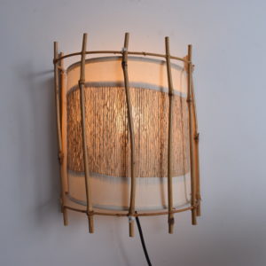 Set of two Louis Sognot bamboo and rattan wall lights sold